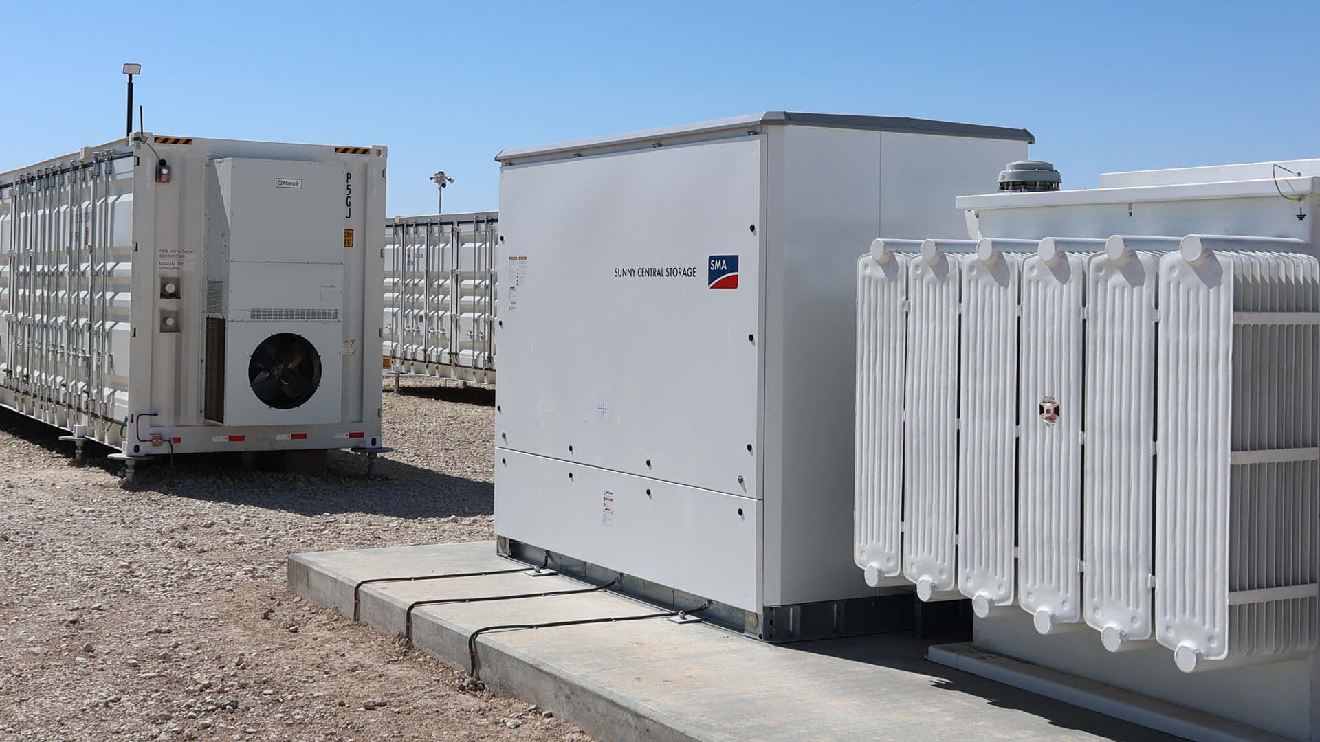 Storage inverter skid and transformer on a project site